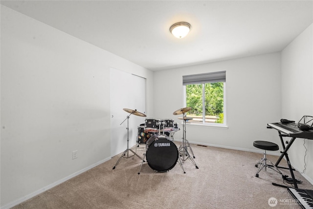 playroom featuring visible vents, carpet flooring, and baseboards