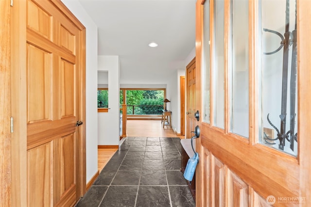 12105 SE 23rd St, Bellevue, WA 98005 - hall featuring stone tile flooring, recessed lighting, and baseboards