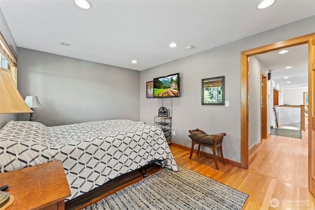 12105 SE 23rd St, Bellevue, WA 98005 - bedroom featuring light wood-style floors, baseboards, and recessed lighting