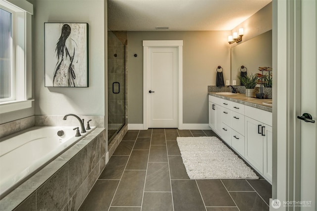 9319 129th Street Ct NW, Gig Harbor, WA 98329 - full bathroom featuring a sink, a bath, tile patterned floors, a stall shower, and double vanity
