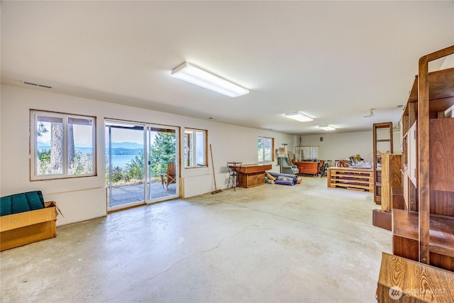 misc room featuring concrete floors and visible vents