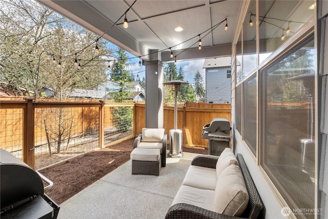 view of patio / terrace featuring area for grilling and a fenced backyard