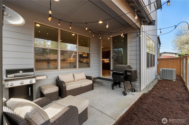 view of patio with grilling area, fence, central AC unit, and an outdoor living space