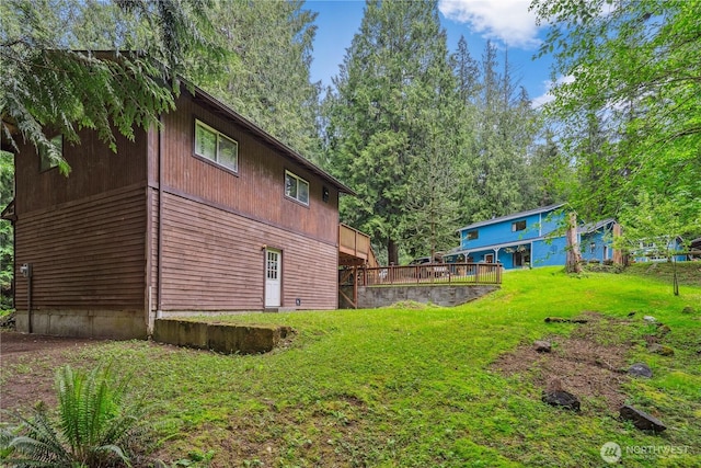 4715 NE Thunder Ln, Poulsbo, WA 98370 - view of grassy yard featuring a deck