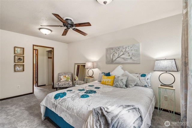 4715 NE Thunder Ln, Poulsbo, WA 98370 - carpeted bedroom with baseboards and ceiling fan
