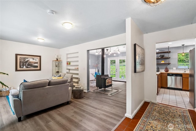 4715 NE Thunder Ln, Poulsbo, WA 98370 - living room featuring plenty of natural light, light wood-type flooring, and built in shelves