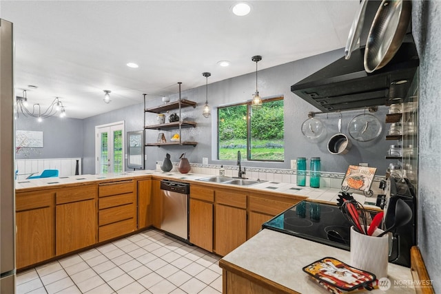 4715 NE Thunder Ln, Poulsbo, WA 98370 - kitchen featuring stainless steel dishwasher, a sink, pendant lighting, light tile patterned flooring, and electric range oven
