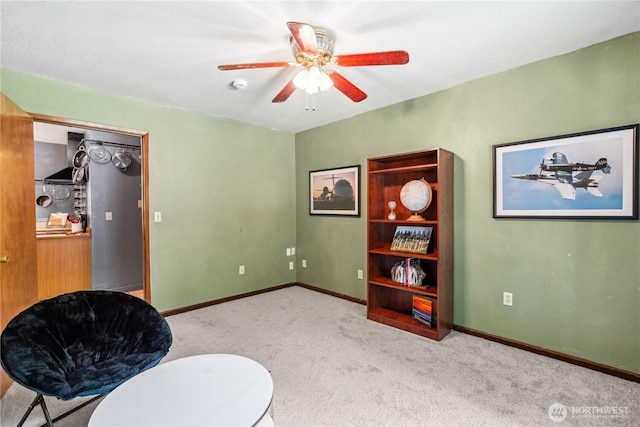 4715 NE Thunder Ln, Poulsbo, WA 98370 - living area featuring carpet flooring, ceiling fan, and baseboards