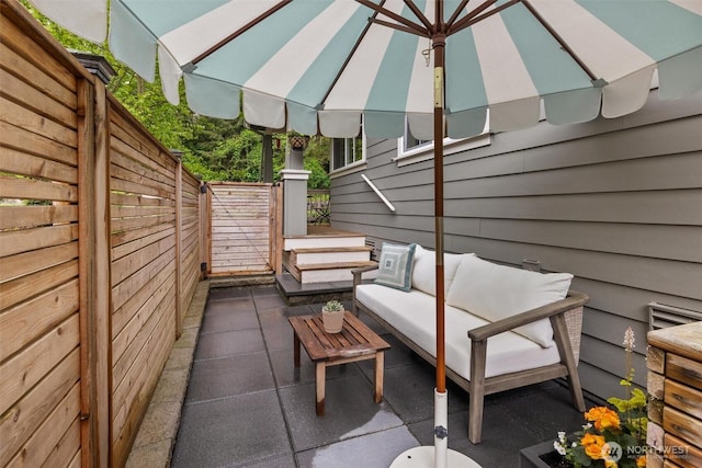 view of patio / terrace with a fenced backyard and outdoor lounge area