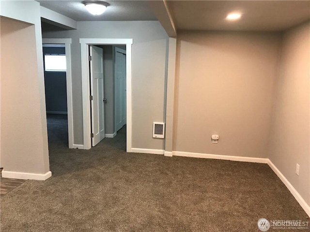 1309 Poindexter Ave Unit A-B, Bremerton, WA 98312 - unfurnished room with dark colored carpet, baseboards, and heating unit