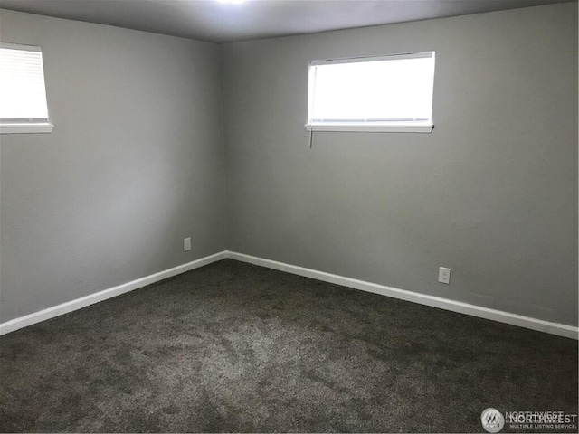 1309 Poindexter Ave Unit A-B, Bremerton, WA 98312 - empty room featuring dark colored carpet and baseboards