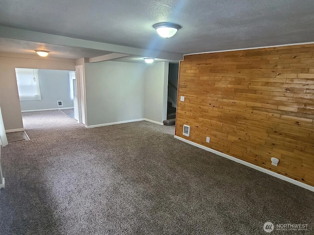 1309 Poindexter Ave Unit A-B, Bremerton, WA 98312 - empty room with wood walls, carpet flooring, stairway, baseboards, and a textured ceiling