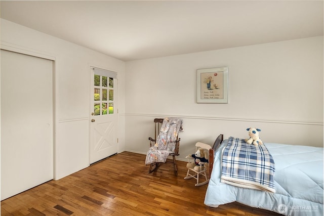 bedroom with wood finished floors