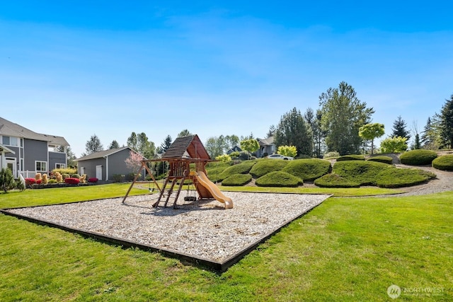 community play area with a yard