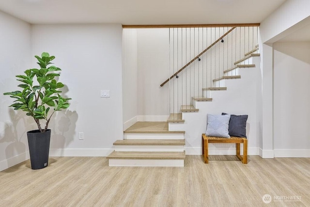 27716 114th Ave E, Graham, WA 98338 - staircase with wood finished floors and baseboards