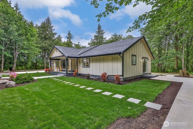 27716 114th Ave E, Graham, WA 98338 - exterior space with a front lawn, covered porch, board and batten siding, and roof with shingles