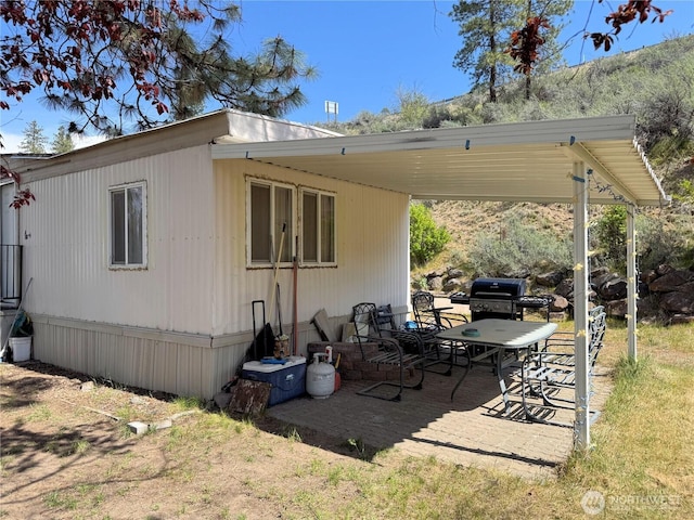 rear view of house with a patio area