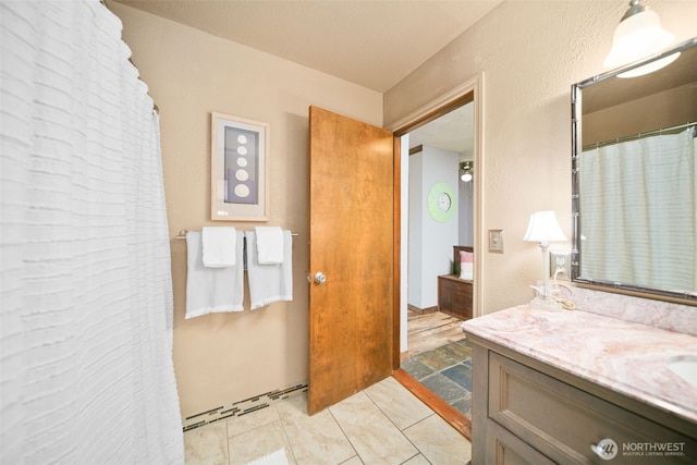full bathroom featuring vanity