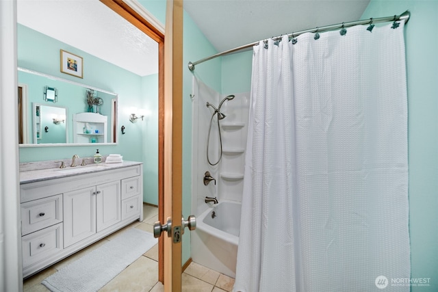 full bathroom featuring vanity, tile patterned flooring, and shower / tub combo