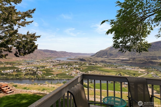 mountain view featuring a water view
