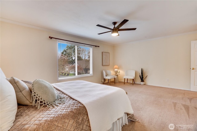 carpeted bedroom with ornamental molding, a ceiling fan, and baseboards