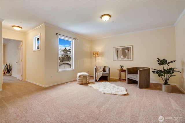 living area with carpet flooring, baseboards, and crown molding