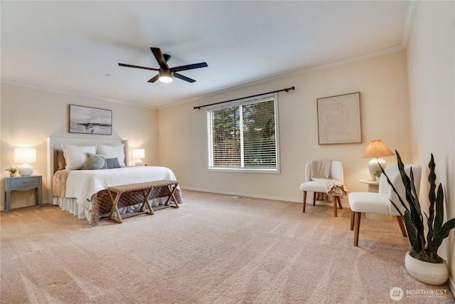 bedroom with baseboards, ornamental molding, a ceiling fan, and carpet flooring