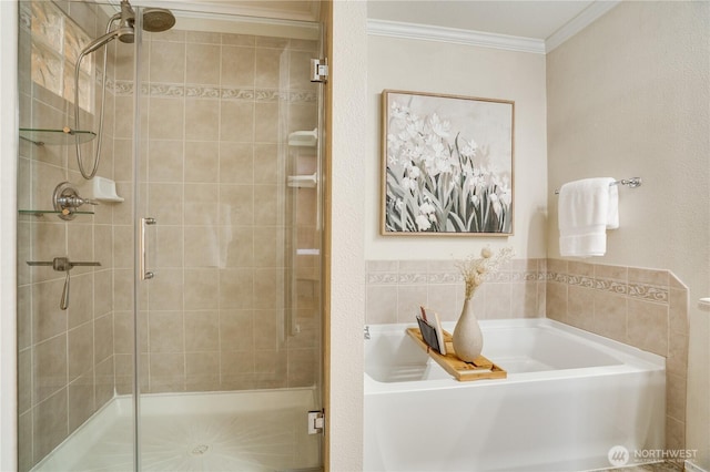 full bath with a shower stall, crown molding, and a bath