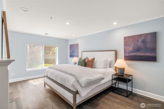 bedroom featuring baseboards, recessed lighting, dark wood-style flooring, and ornamental molding
