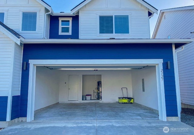 garage featuring driveway