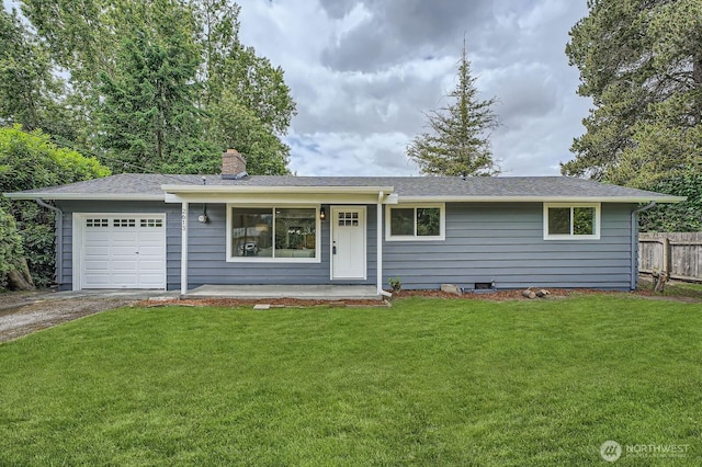 2613 Pike St SE, Auburn, WA 98002 - single story home with asphalt driveway, a garage, a chimney, a porch, and a shingled roof