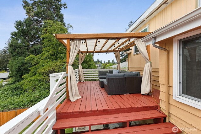 deck featuring outdoor lounge area