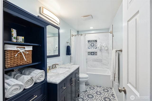 bathroom featuring toilet, vanity, and shower / bath combo