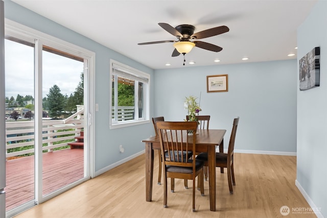 dining room with light wood-style flooring, baseboards, ceiling fan, and recessed lighting