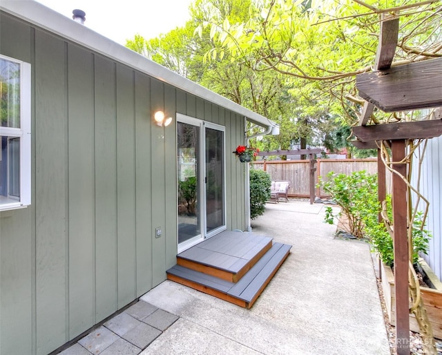 view of patio / terrace featuring fence