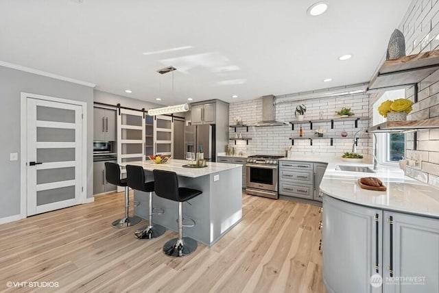 kitchen with gray cabinetry, appliances with stainless steel finishes, and open shelves