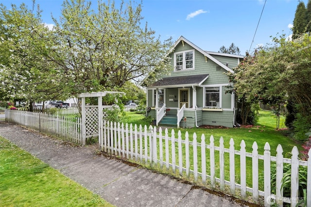 bungalow-style house featuring a porch, crawl space, a fenced front yard, and a front yard