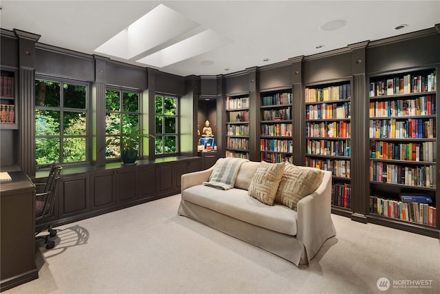 9325 Fauntleroy Way SW, Seattle, WA 98136 - living area with carpet flooring and built in shelves