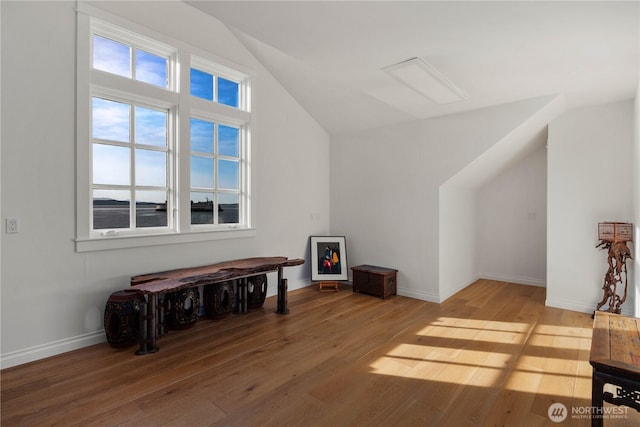 9325 Fauntleroy Way SW, Seattle, WA 98136 - bonus room featuring baseboards, wood finished floors, and lofted ceiling