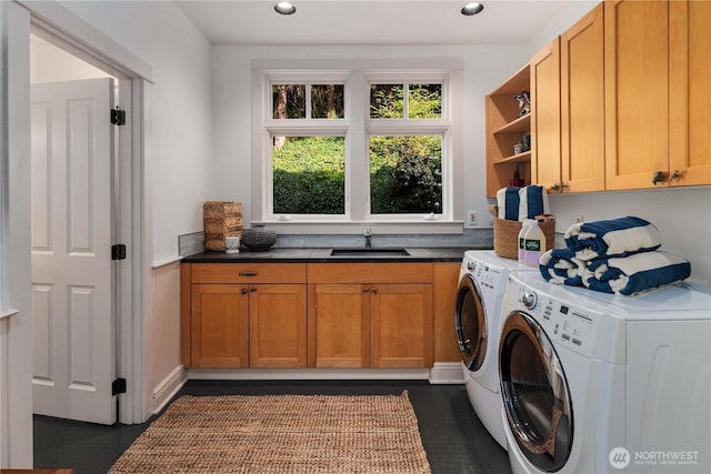 9325 Fauntleroy Way SW, Seattle, WA 98136 - washroom featuring washer and dryer, recessed lighting, a sink, and cabinet space