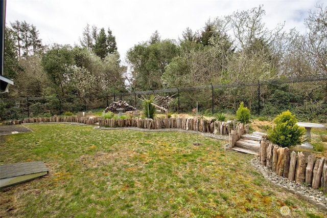 view of yard with fence