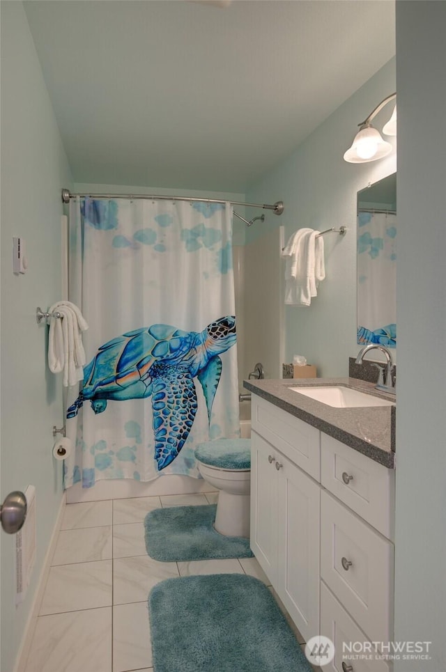 full bath with vanity and toilet