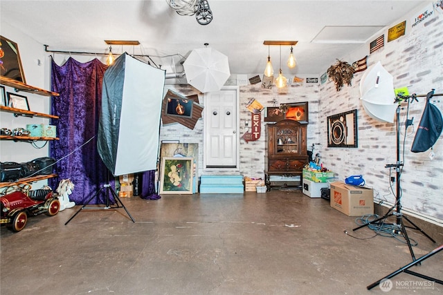 misc room featuring visible vents and concrete flooring