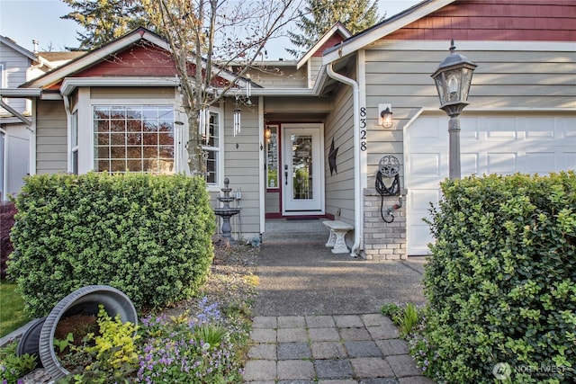entrance to property with a garage