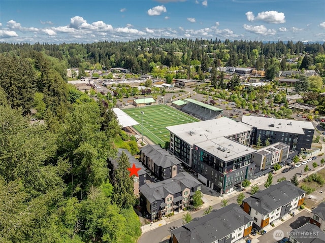drone / aerial view of a heavily wooded area