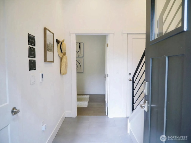 18517 96th Dr NE Unit A, Bothell, WA 98011 - entryway featuring baseboards, tile patterned floors, and stairway