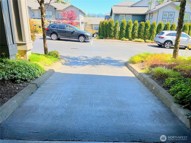 view of yard featuring a residential view