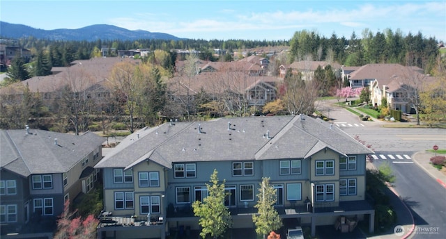 aerial view with a residential view and a mountain view