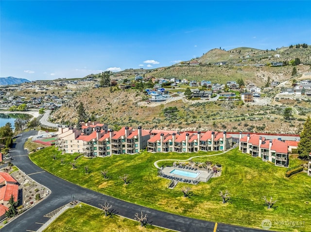 birds eye view of property featuring a mountain view