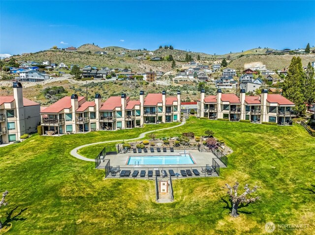 aerial view featuring a mountain view and a residential view